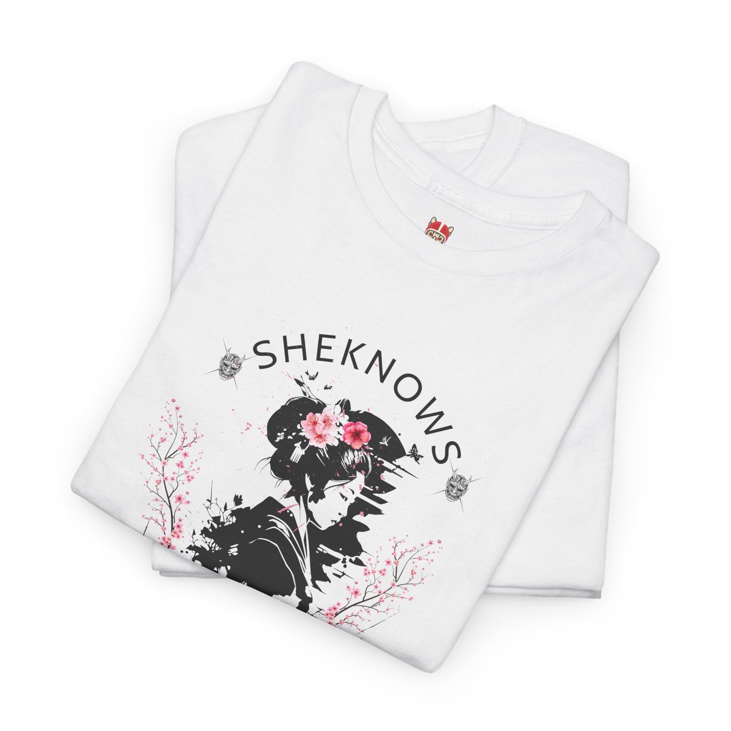 She knows - Unisex Heavy Cotton Tee